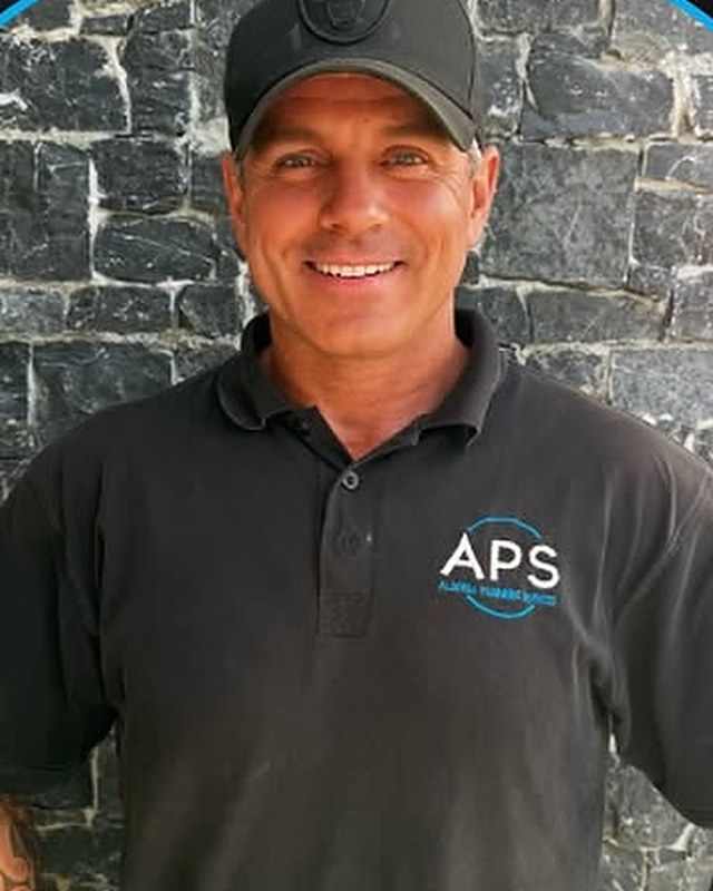 Clint in his black APS work shirt